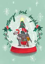 Festive decorating  dogs inside snowglobe  created by Sinead Peyton