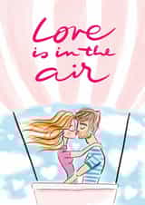 Happy Anniversary card. Kissing couple in a hot air balloon in the sky. created by Paula Romani Studio