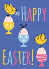 Cute Easter greeting card with little chickens on colored egg cups created by Nastea Fedorenko