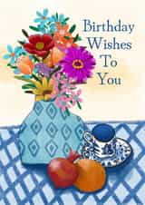 Arty botanical birthday card featuring vibrant flowers in a blue vase. created by Sharonflemingart