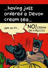 Batman and Robin having a Devon cream tea created by devoncow graphic design