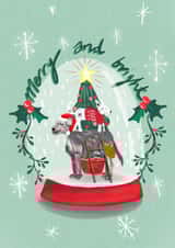 Festive decorating  dogs inside snowglobe  created by Sinead Peyton