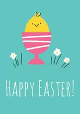 Easter greeting card with a little chicken in a painted egg cup created by Nastea Fedorenko